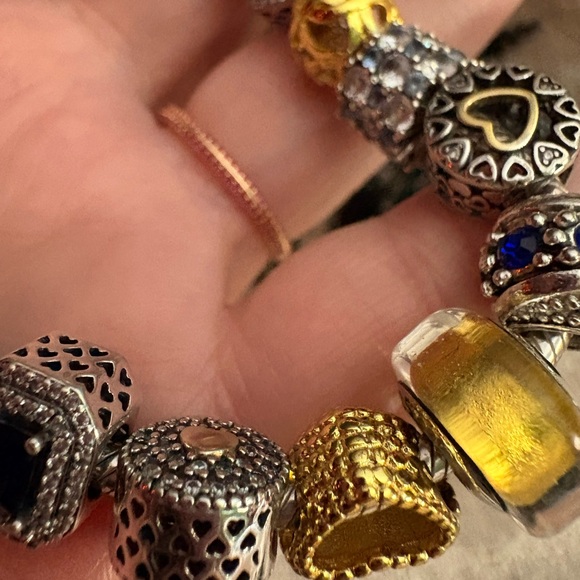 Pandora bracelet with silver, gold, blue charms - Picture 4 of 6